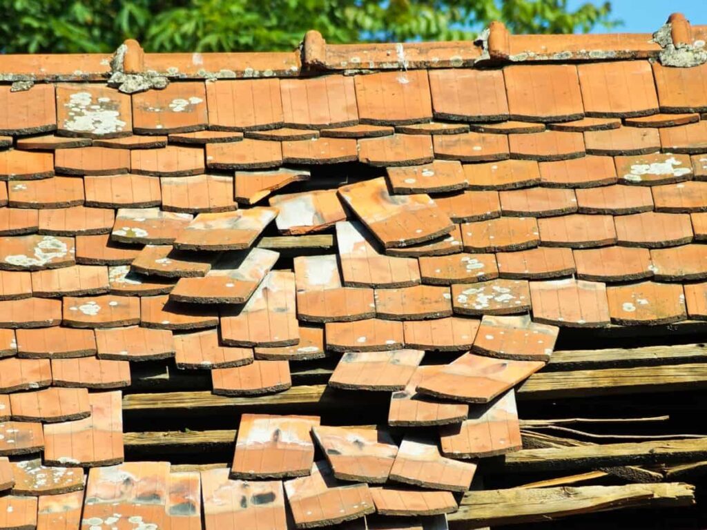 cedar roof damaged by the storm