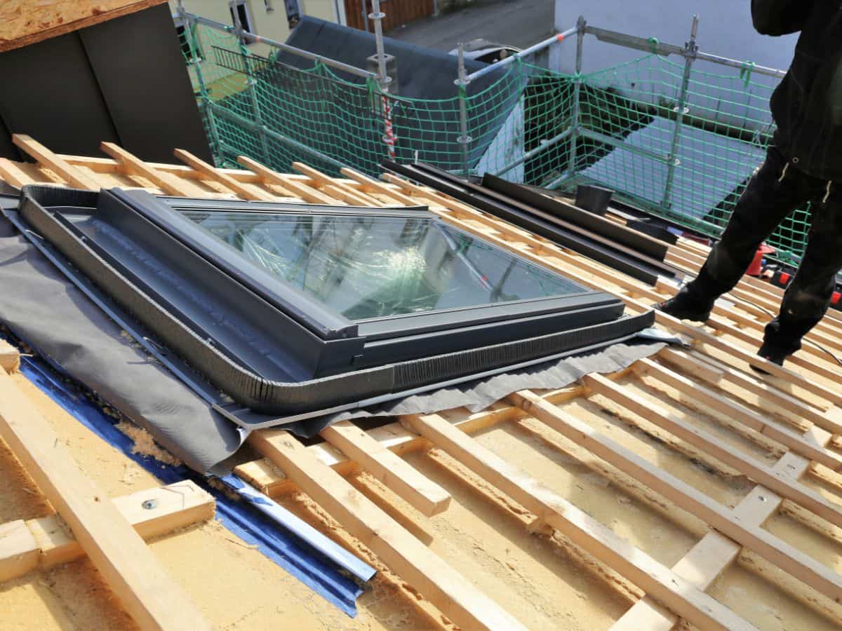 roofer installing a skylight