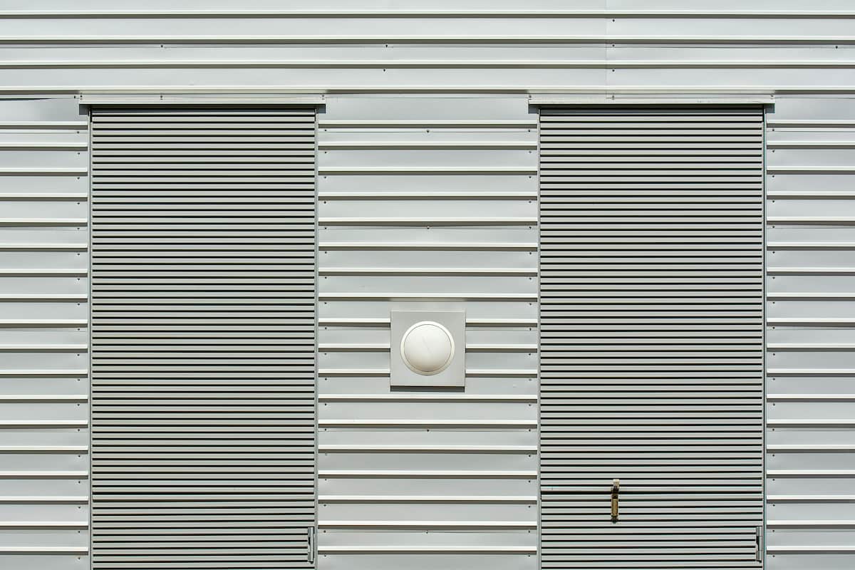 Roller Blinds on a House Building