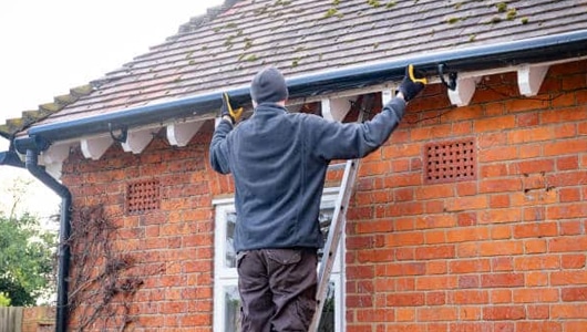 Clean and Maintain Gutters and Downspouts