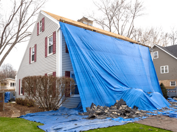 Emergency siding tarp